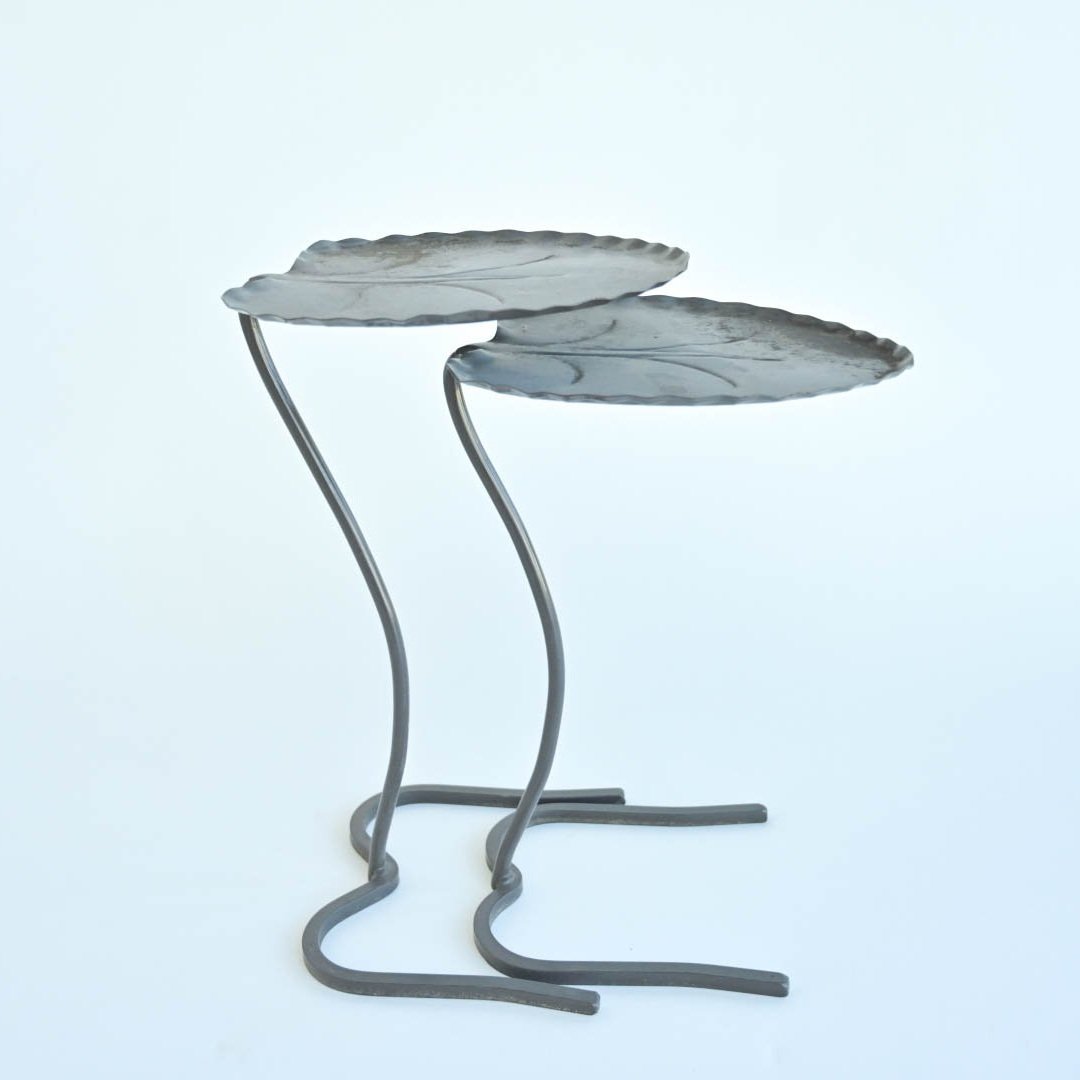 PAIR OF JOHN SALTERINI NESTING LILY PAD TABLES