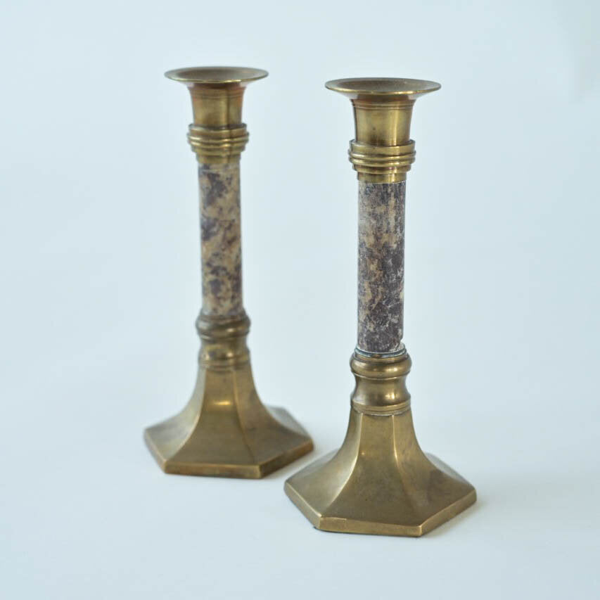 PAIR OF STONE AND BRASS CANDLE HOLDERS