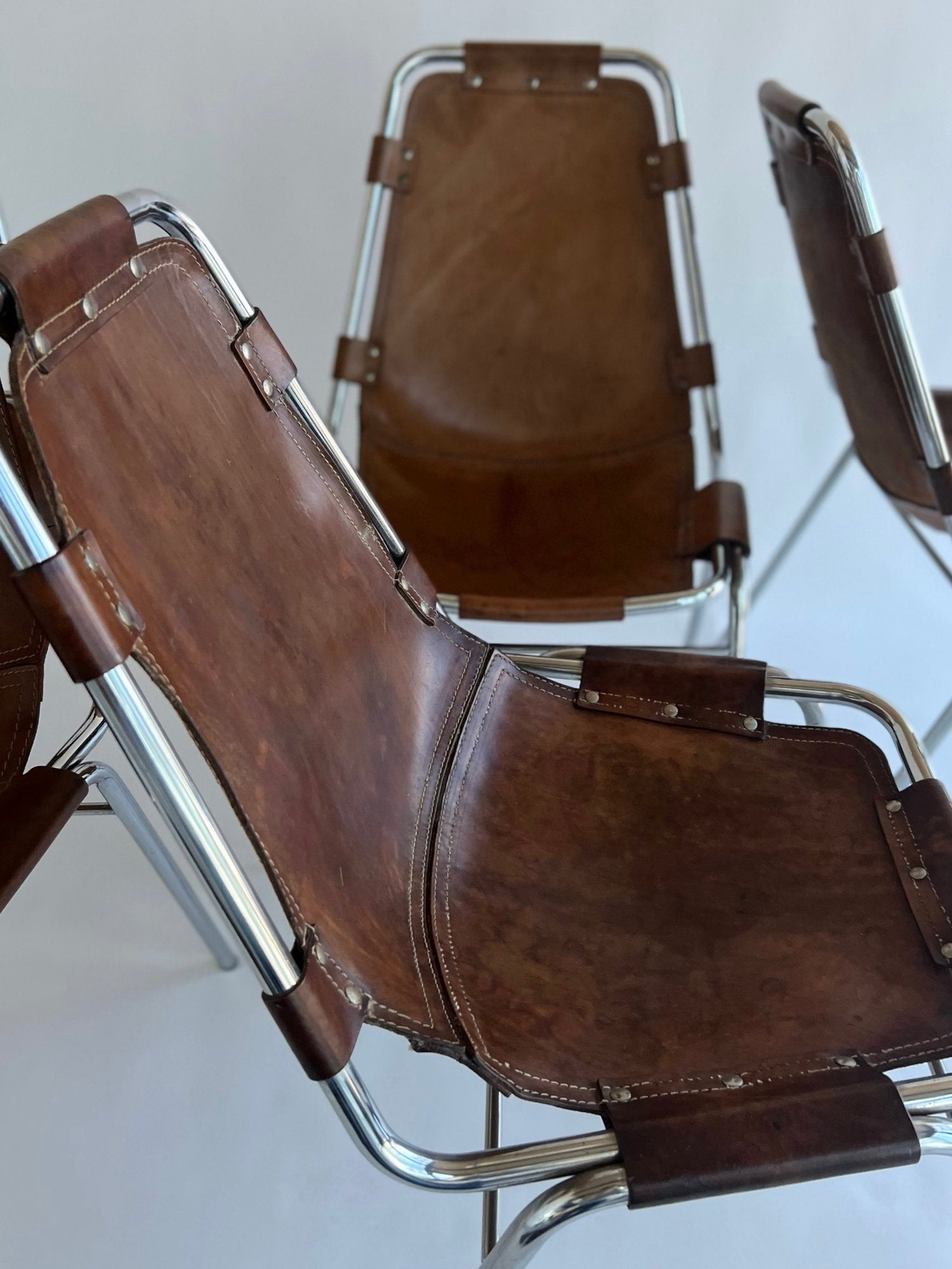 SET OF TEN LES ARC DINING CHAIRS