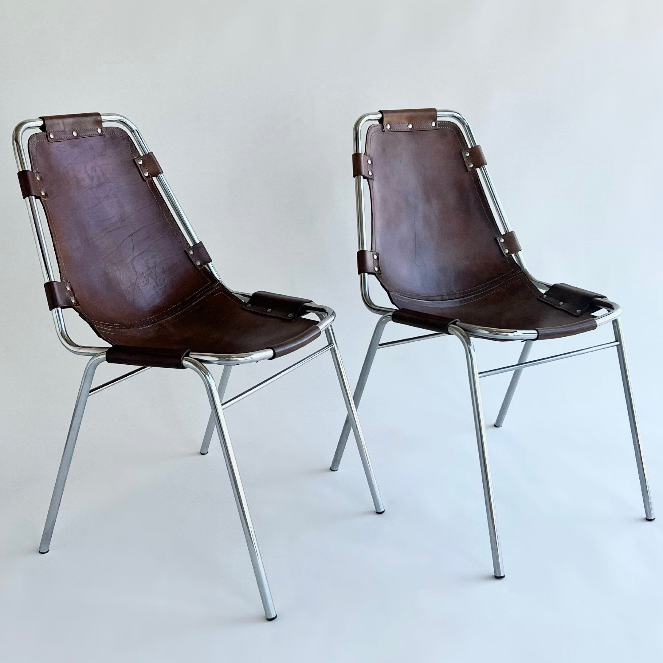 SET OF TEN LES ARC DINING CHAIRS