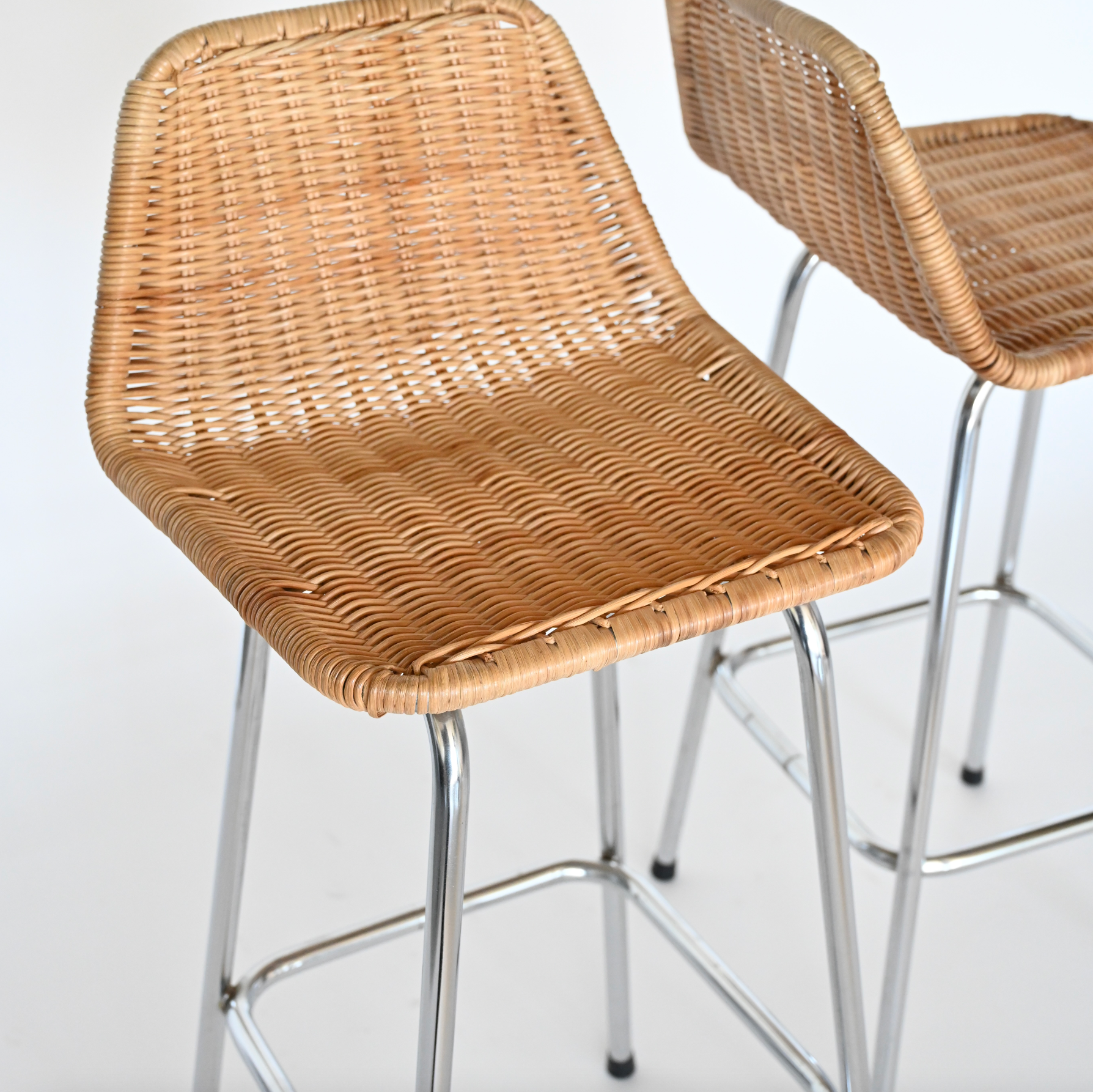PAIR OF RATTAN AND CHROME COUNTER STOOLS BY DIRK VAN SLIEDRECHT