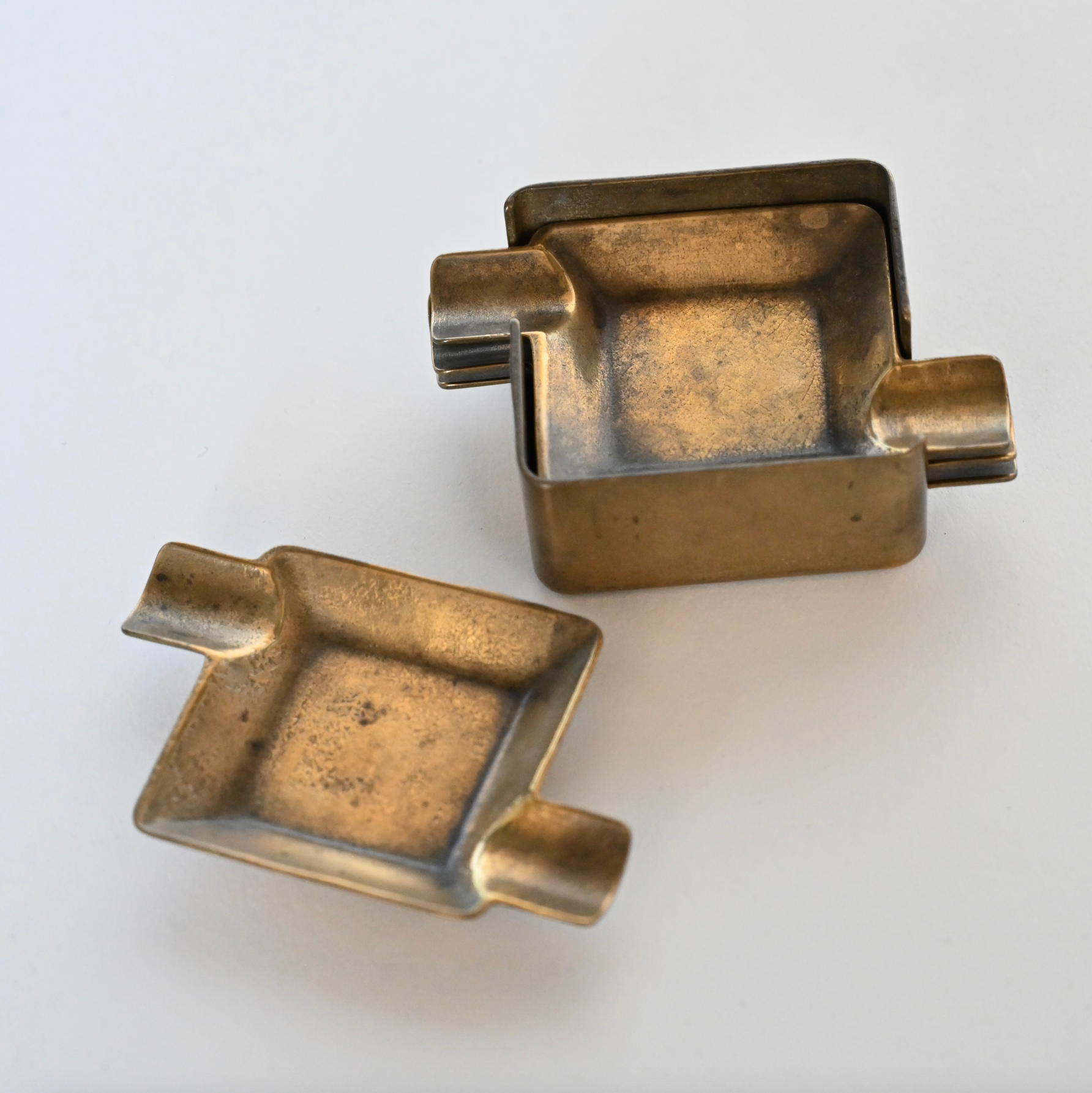 SET OF 4 BRASS ASHTRAYS