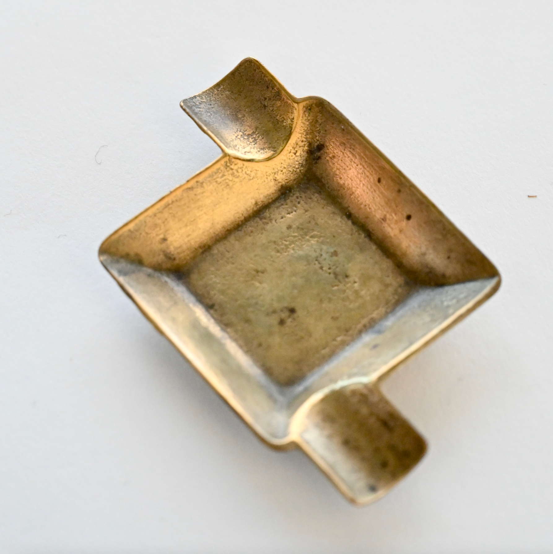 SET OF 4 BRASS ASHTRAYS