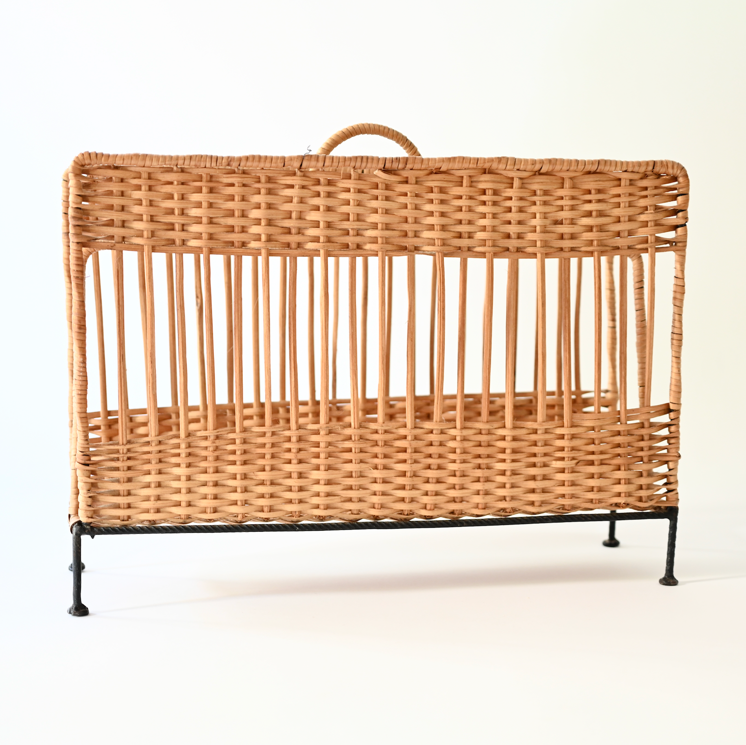 FRENCH RATTAN AND IRON MAGAZINE HOLDER