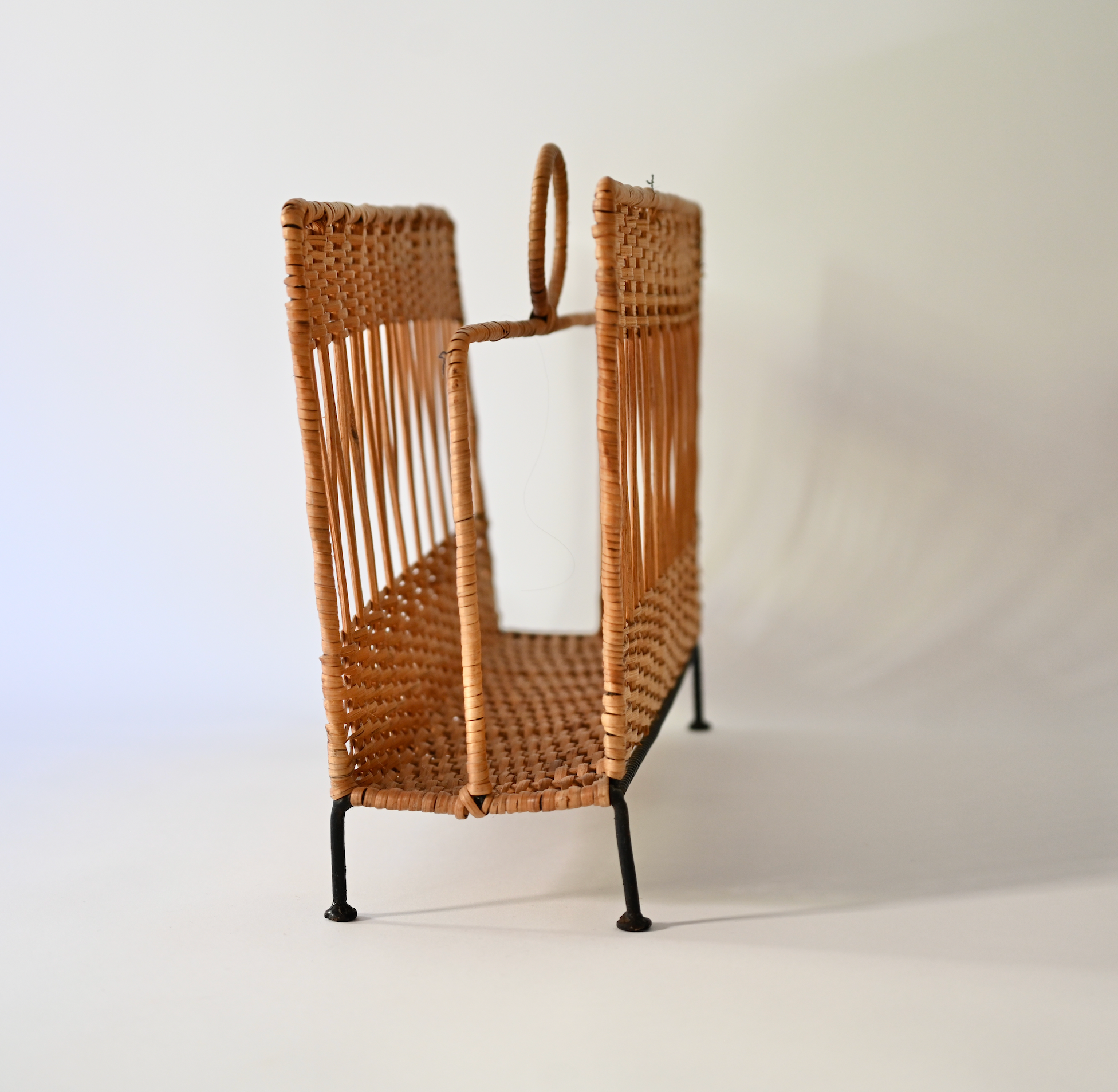 FRENCH RATTAN AND IRON MAGAZINE HOLDER