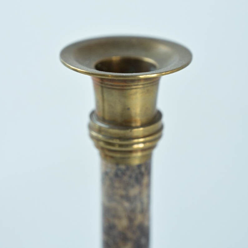 PAIR OF STONE AND BRASS CANDLE HOLDERS
